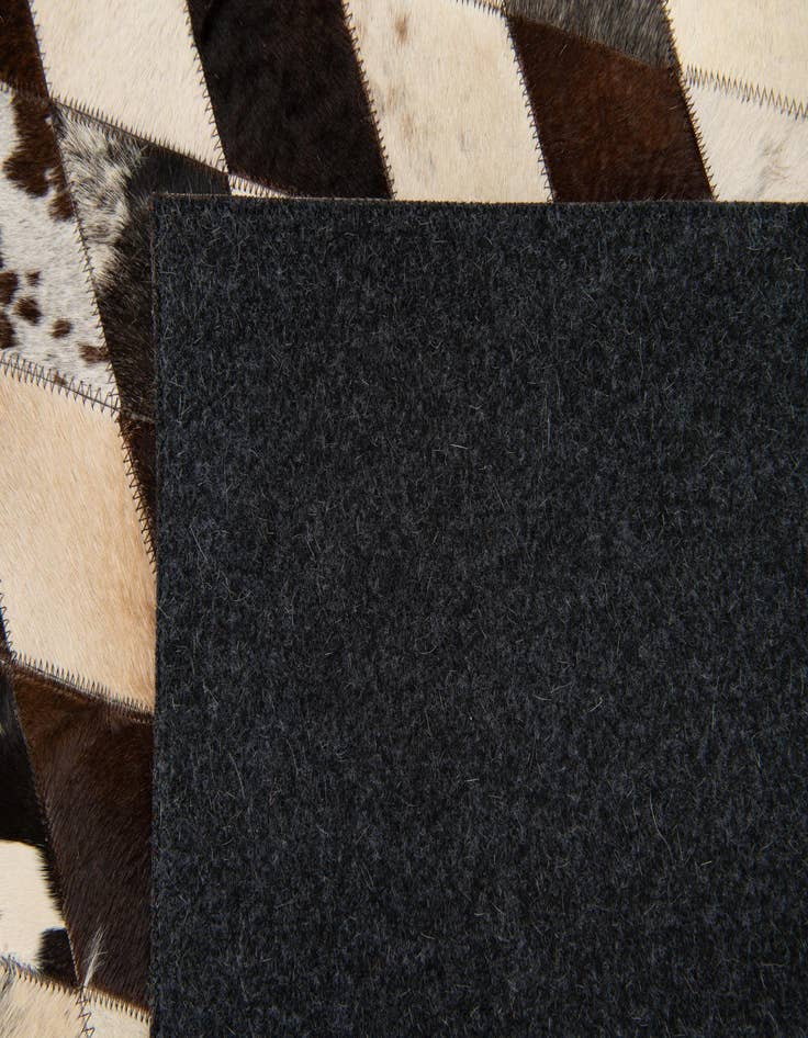 Detail image of 5' 8 x 8' Cowhide Stocks Rug