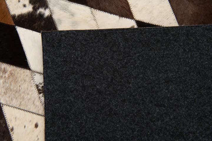 5' 7 x 8' Cowhide Stocks Rug