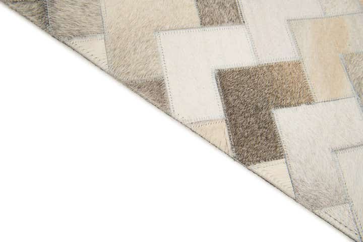 5' 7 x 7' 10 Cowhide Stocks Rug