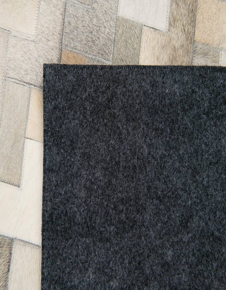 Detail image of 5' 7 x 7' 10 Cowhide Stocks Rug