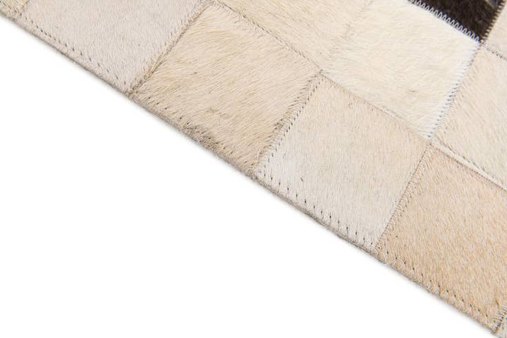 Detail image of 5' x 7' 9 Cowhide Stocks Rug