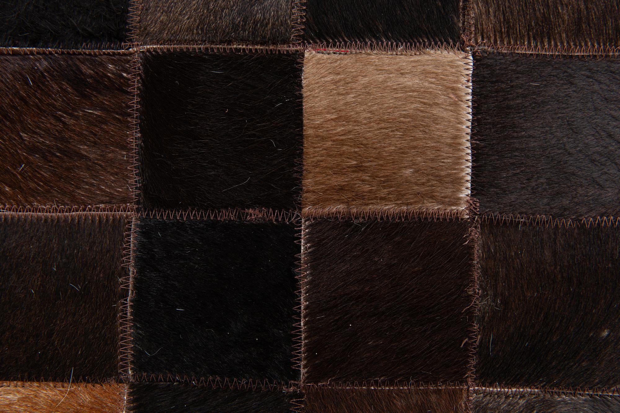 5' x 7' 9 Cowhide Stocks Rug