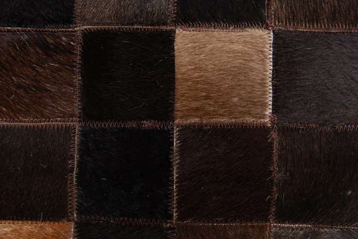 5' x 7' 9 Cowhide Stocks Rug