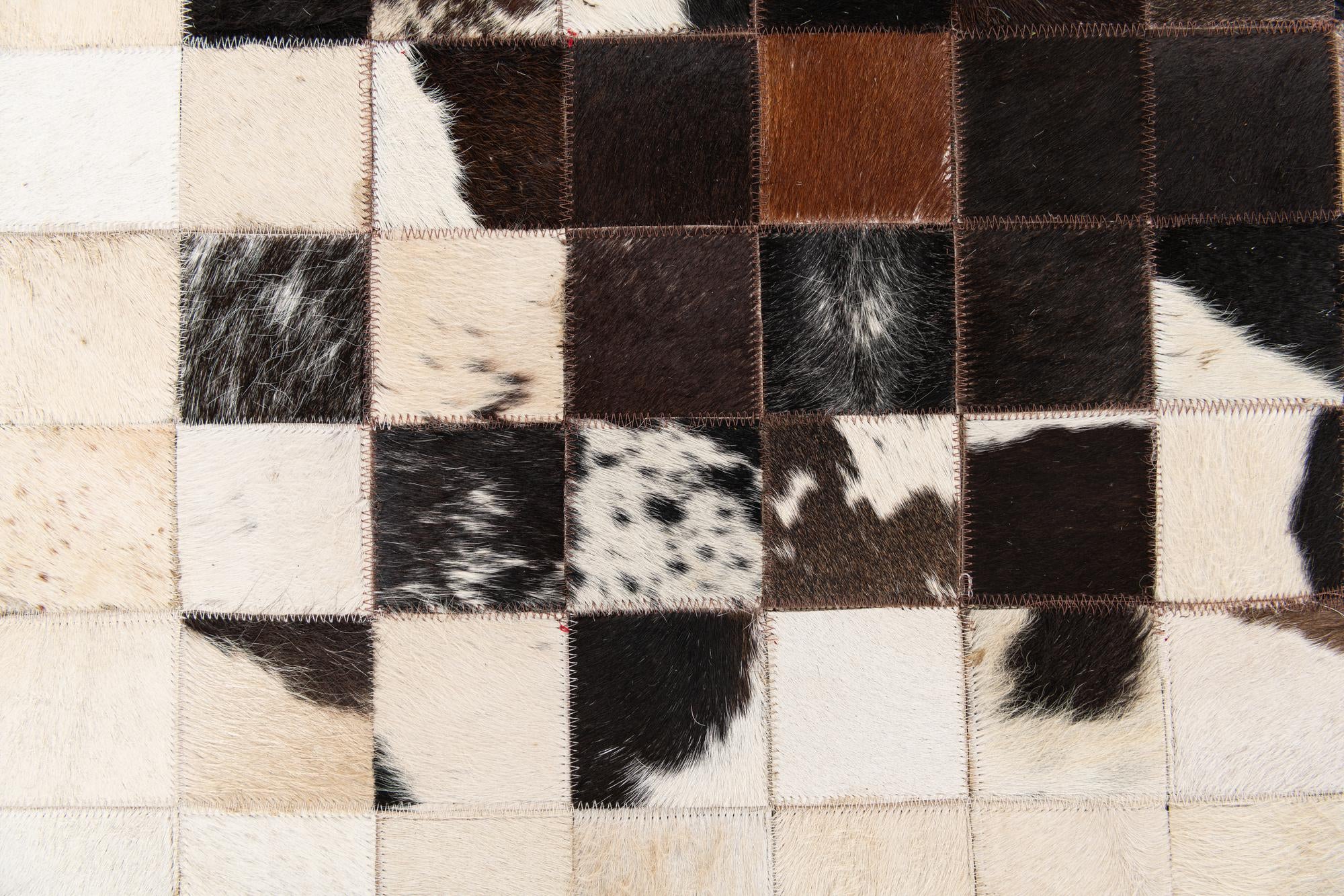 5' x 7' 9 Cowhide Stocks Rug