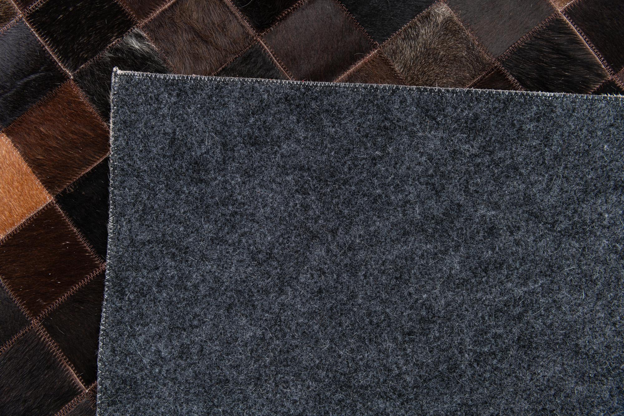 5' x 7' 9 Cowhide Stocks Rug