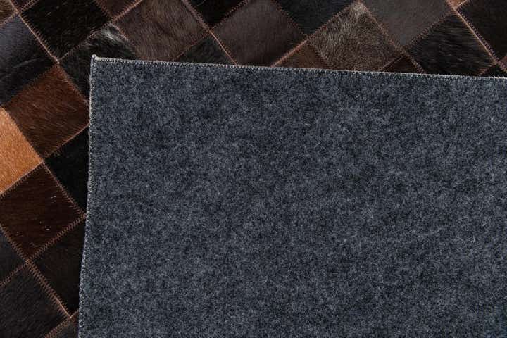 5' x 7' 9 Cowhide Stocks Rug