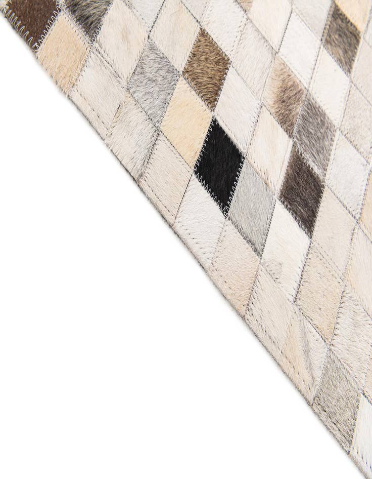 Detail image of 5' x 7' 11 Cowhide Stocks Rug