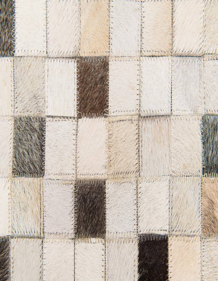 Detail image of 5' x 7' 11 Cowhide Stocks Rug