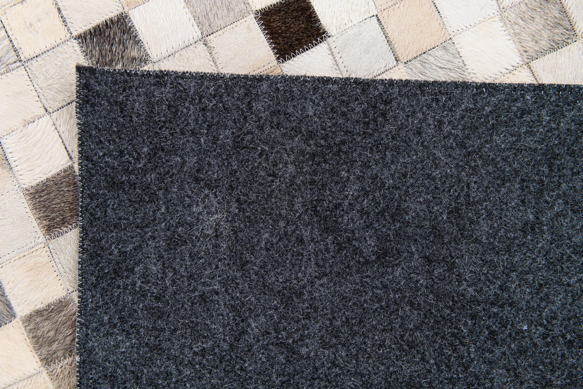 5' x 7' 11 Cowhide Stocks Rug
