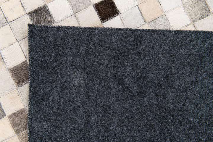 5' x 7' 11 Cowhide Stocks Rug