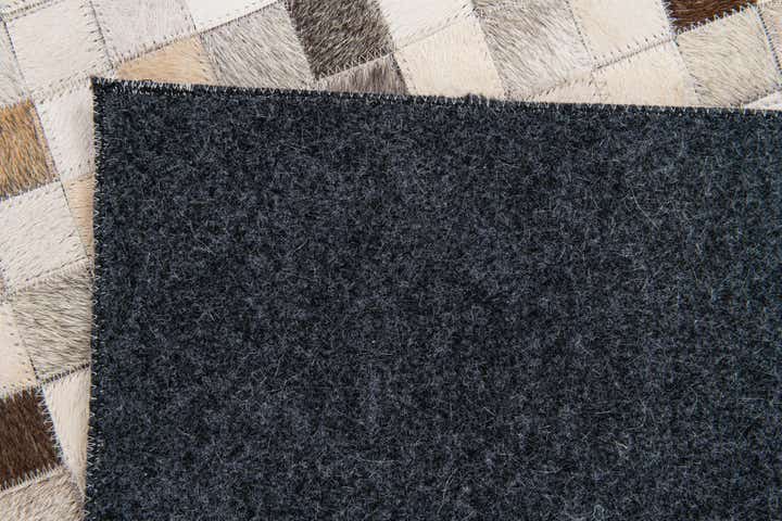 5' x 7' 11 Cowhide Stocks Rug
