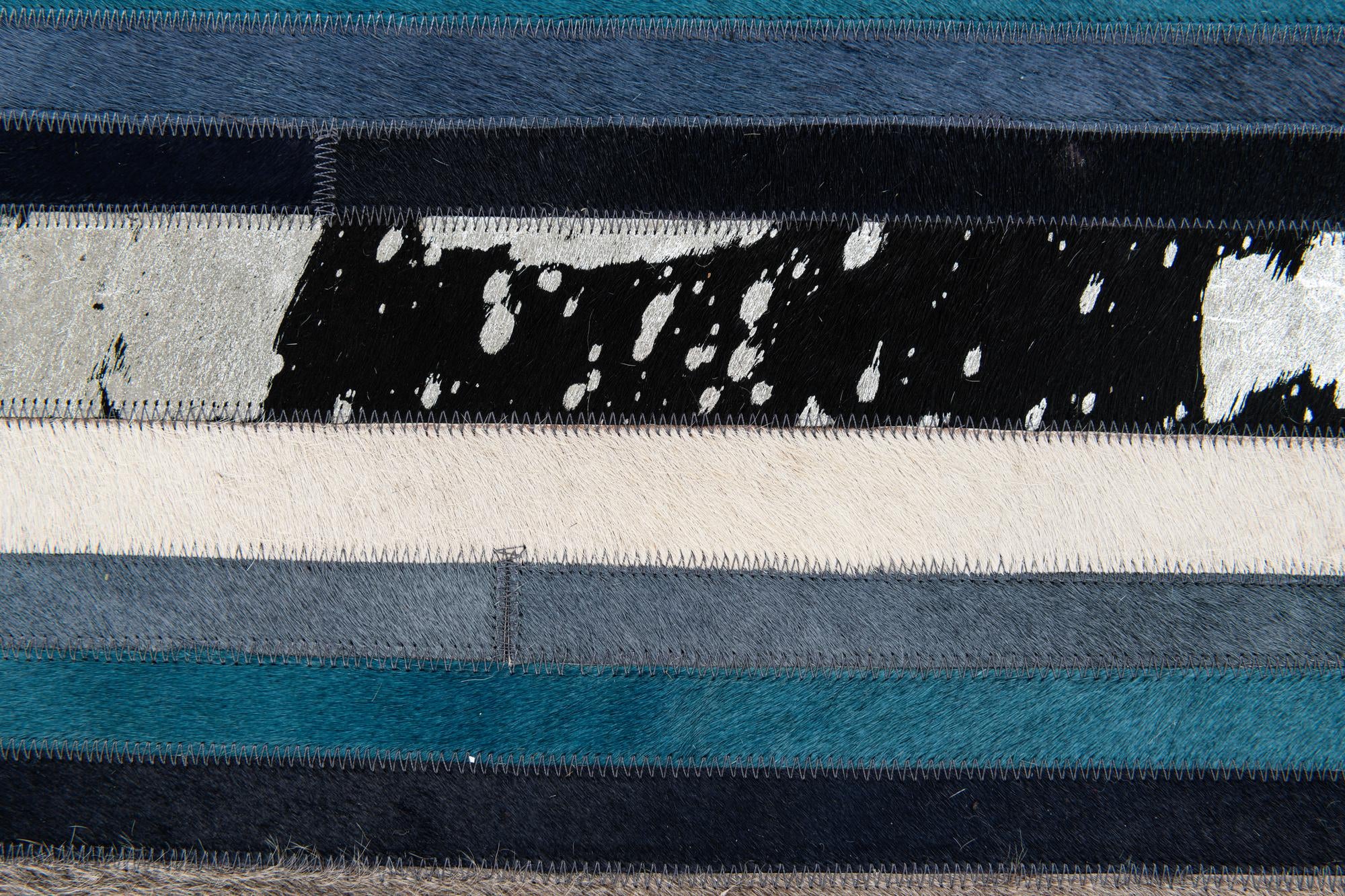 5' x 8' Cowhide Stocks Rug