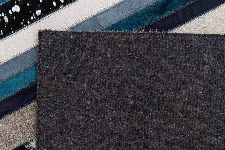5' x 8' Cowhide Stocks Rug