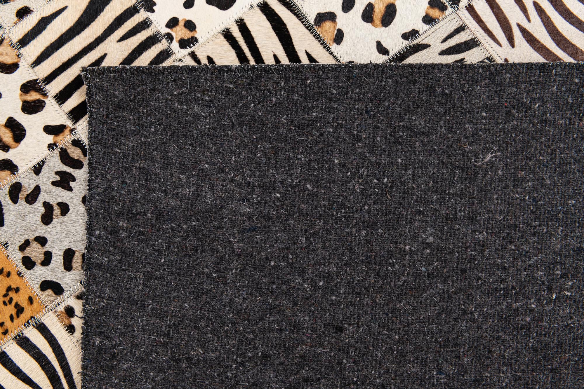 5' 1 x 8' Cowhide Stocks Rug