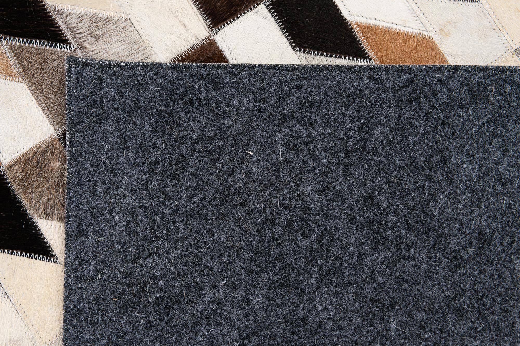 5' x 8' Cowhide Stocks Rug