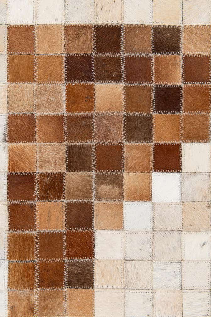 5' 1 x 7' 11 Cowhide Stocks Rug