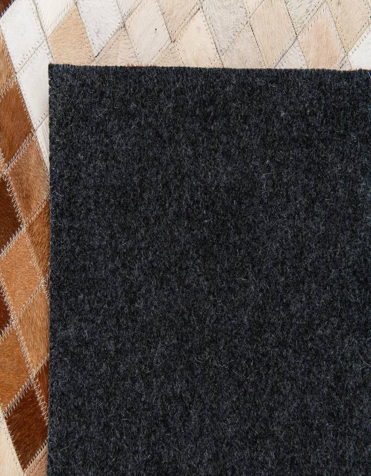 Detail image of 5' 1 x 7' 11 Cowhide Stocks Rug