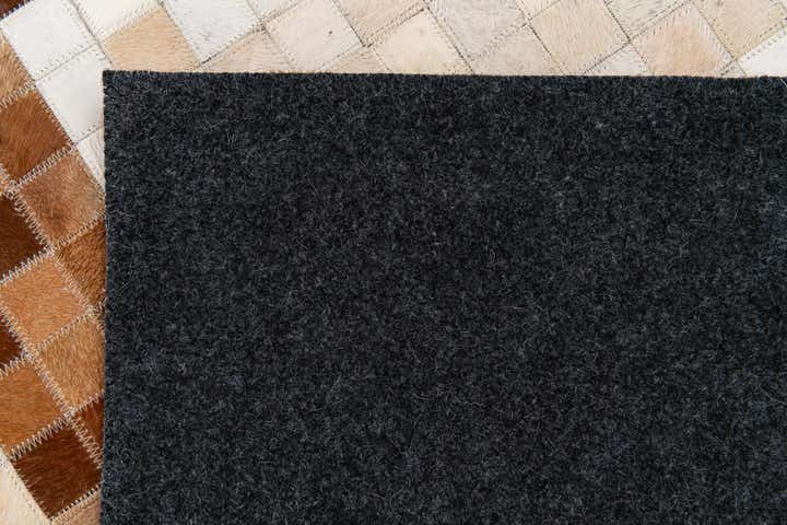 5' 1 x 7' 11 Cowhide Stocks Rug