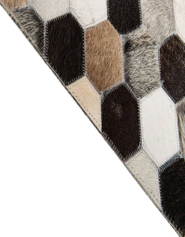 Detail image of 5' 1 x 8' 1 Cowhide Stocks Rug
