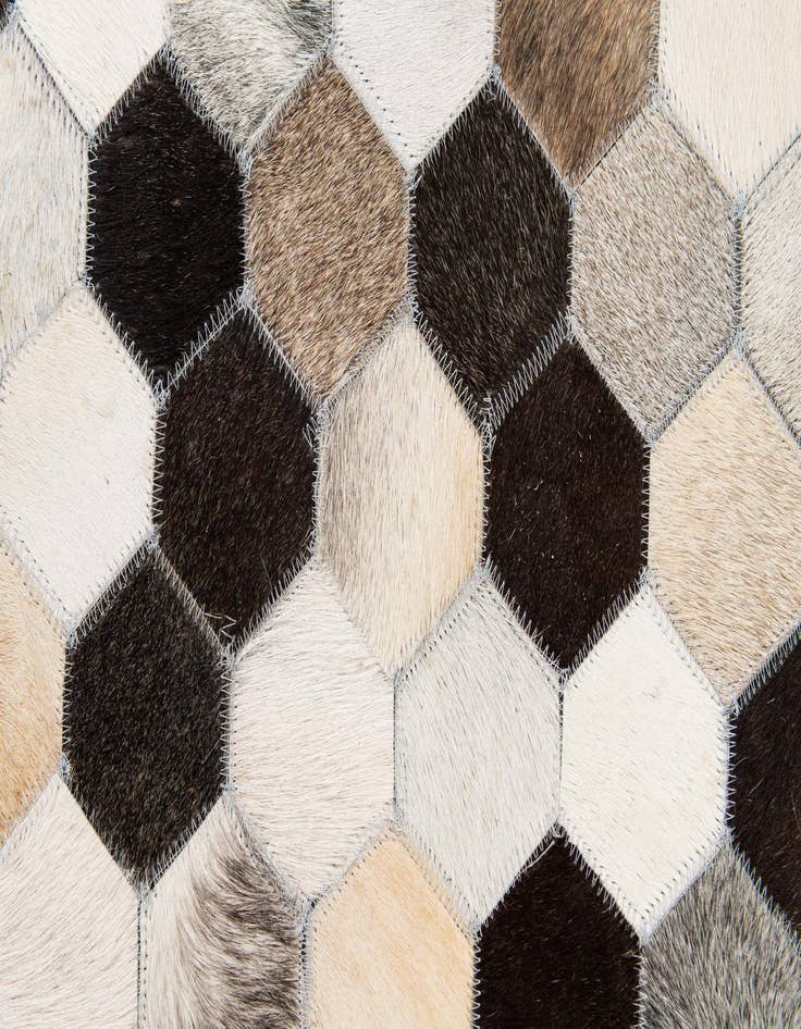 Detail image of 5' 1 x 8' 1 Cowhide Stocks Rug