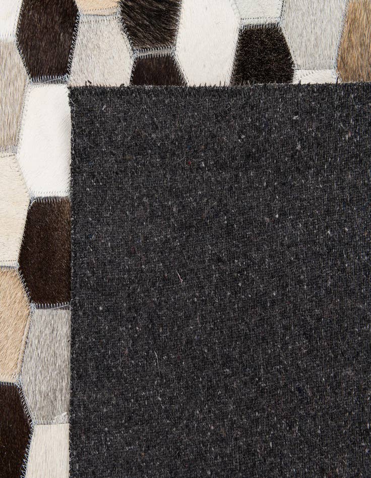 Detail image of 5' 1 x 8' 1 Cowhide Stocks Rug