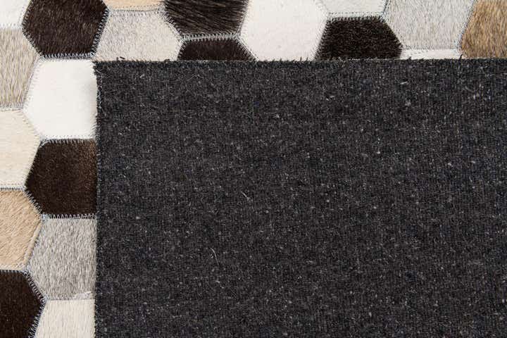5' 1 x 8' 1 Cowhide Stocks Rug