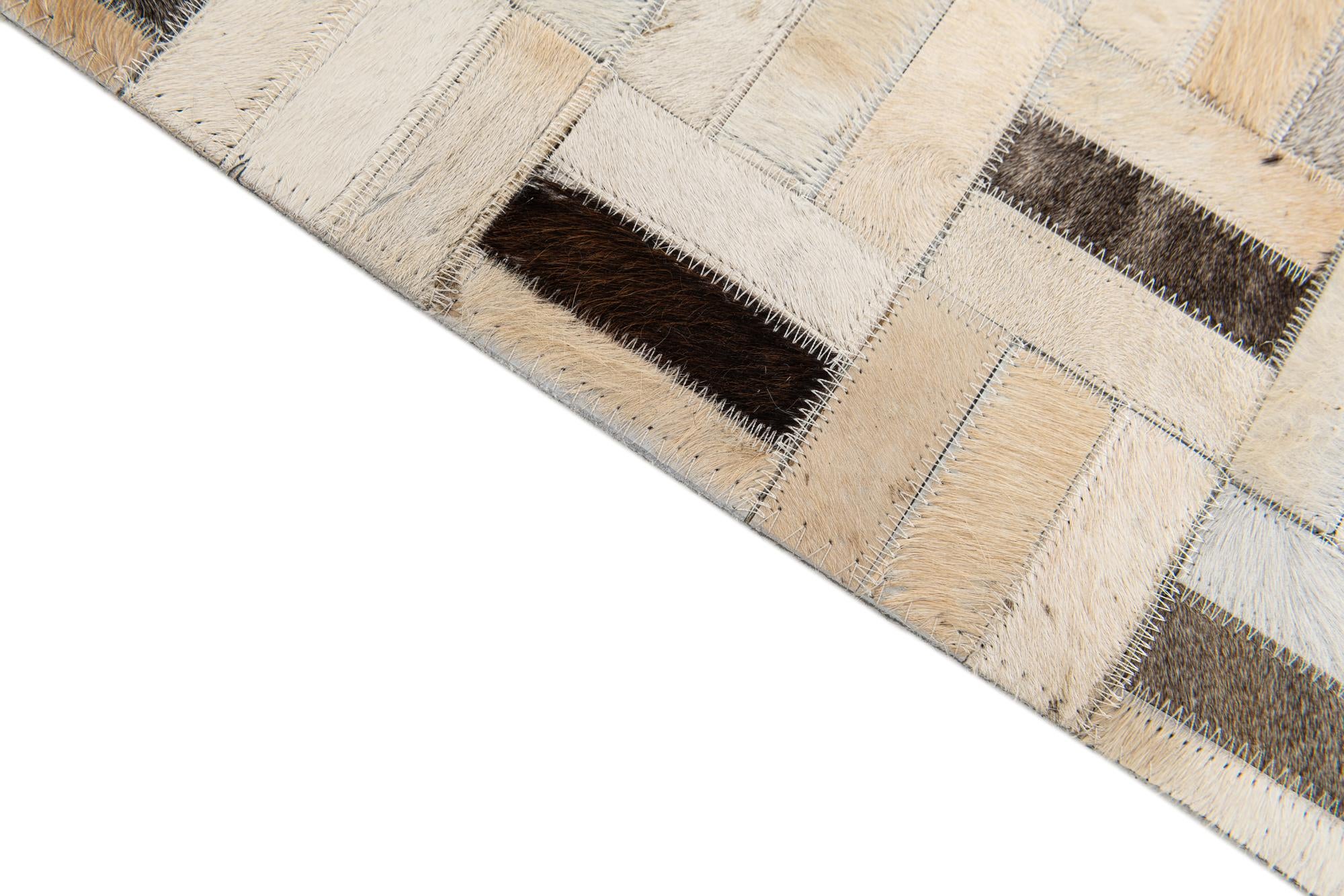 5' 1 x 8' Cowhide Stocks Rug