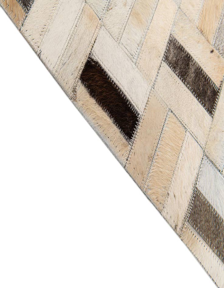 Detail image of 5' 1 x 8' Cowhide Stocks Rug