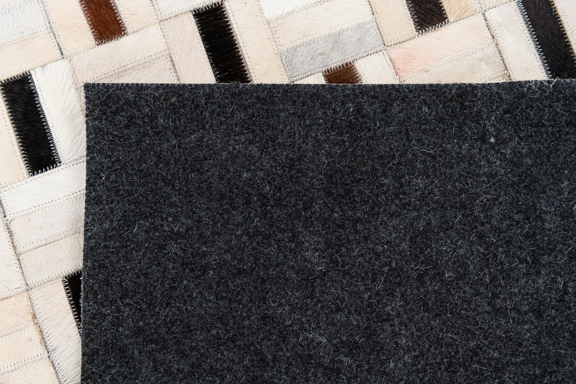 5' 1 x 8' Cowhide Stocks Rug