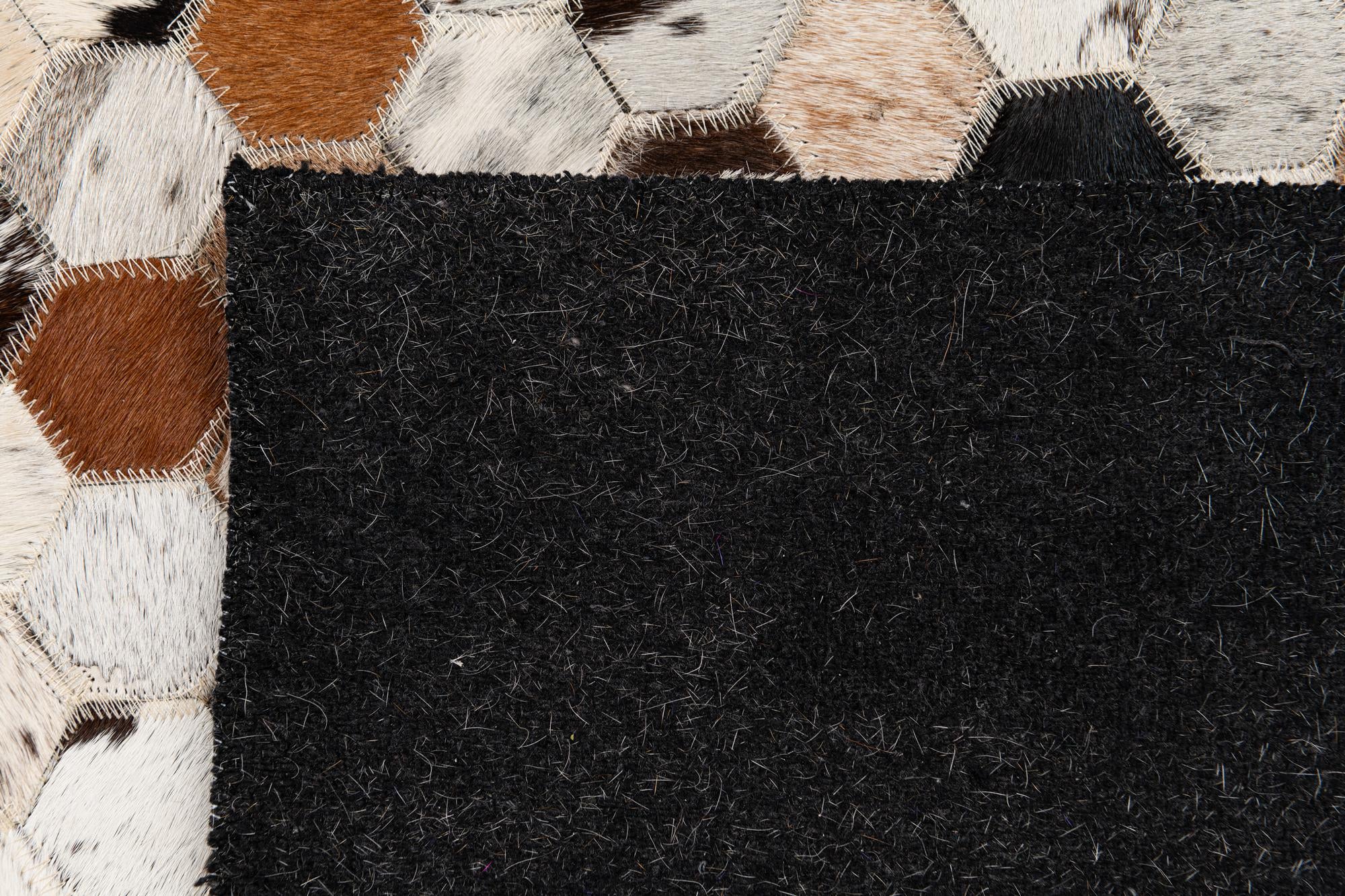 5' x 7' 10 Cowhide Stocks Rug