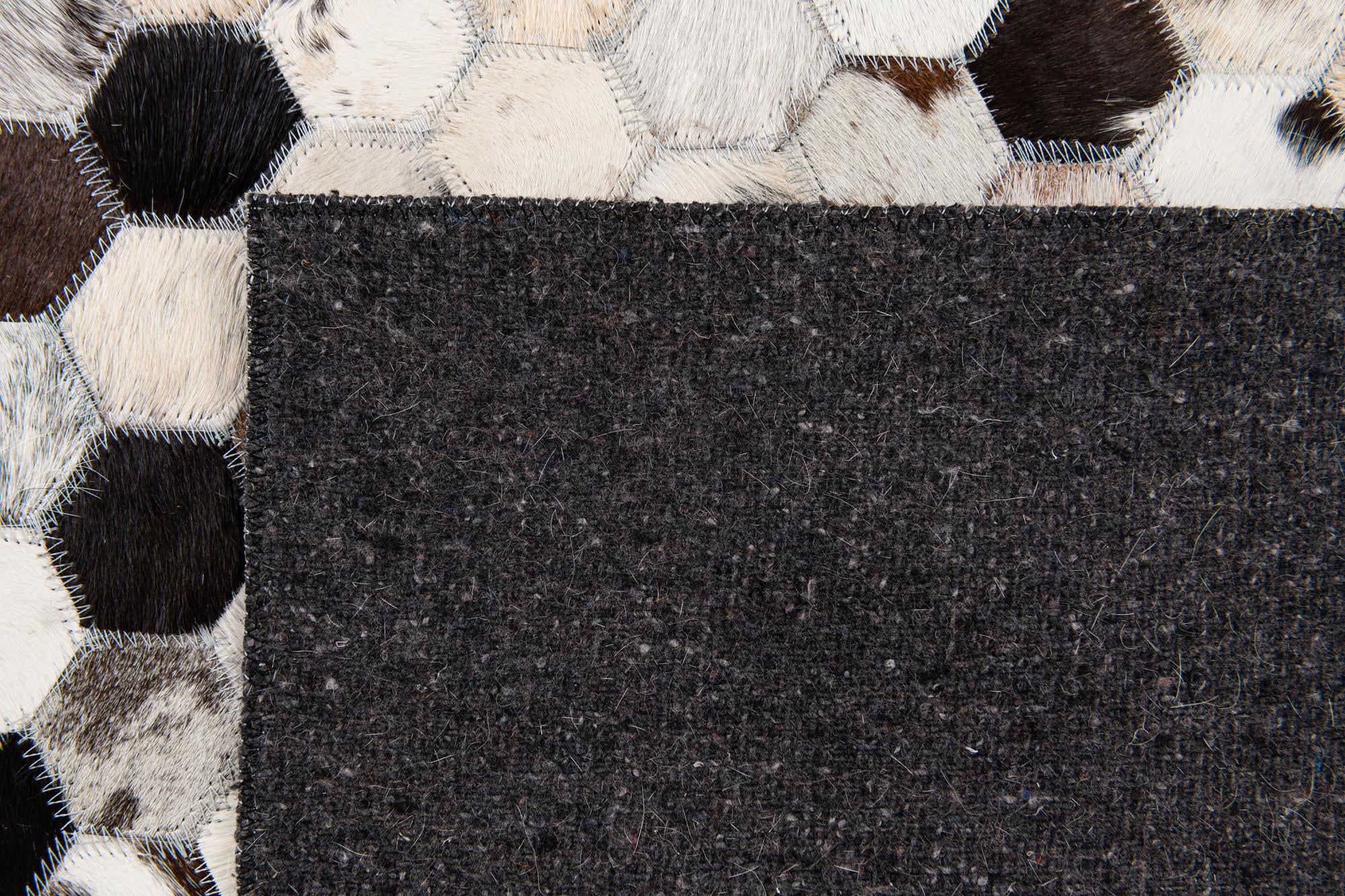 5' x 8' Cowhide Stocks Rug