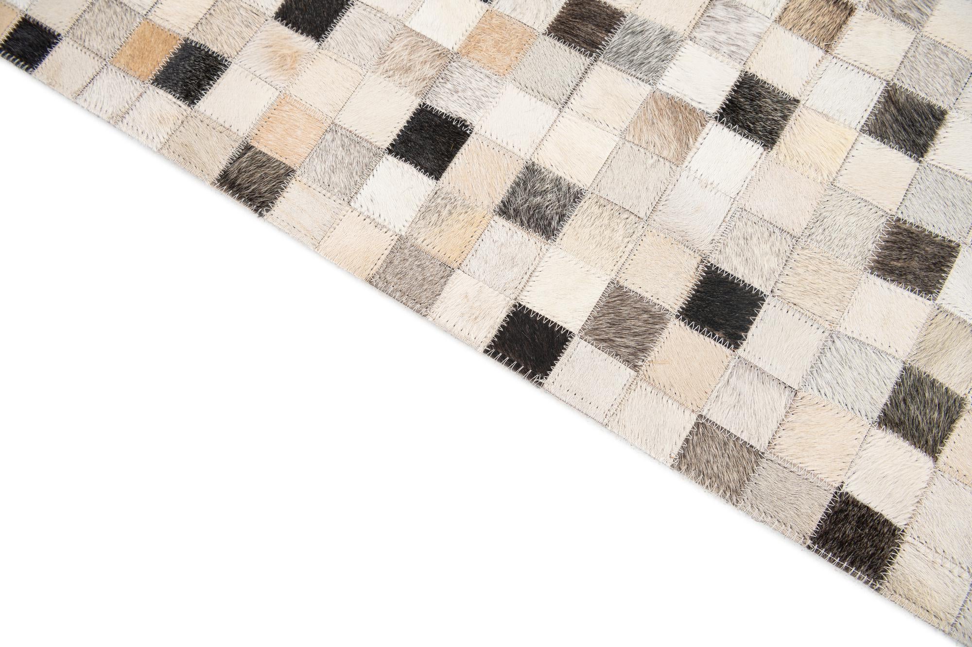 5' 1 x 8' Cowhide Stocks Rug