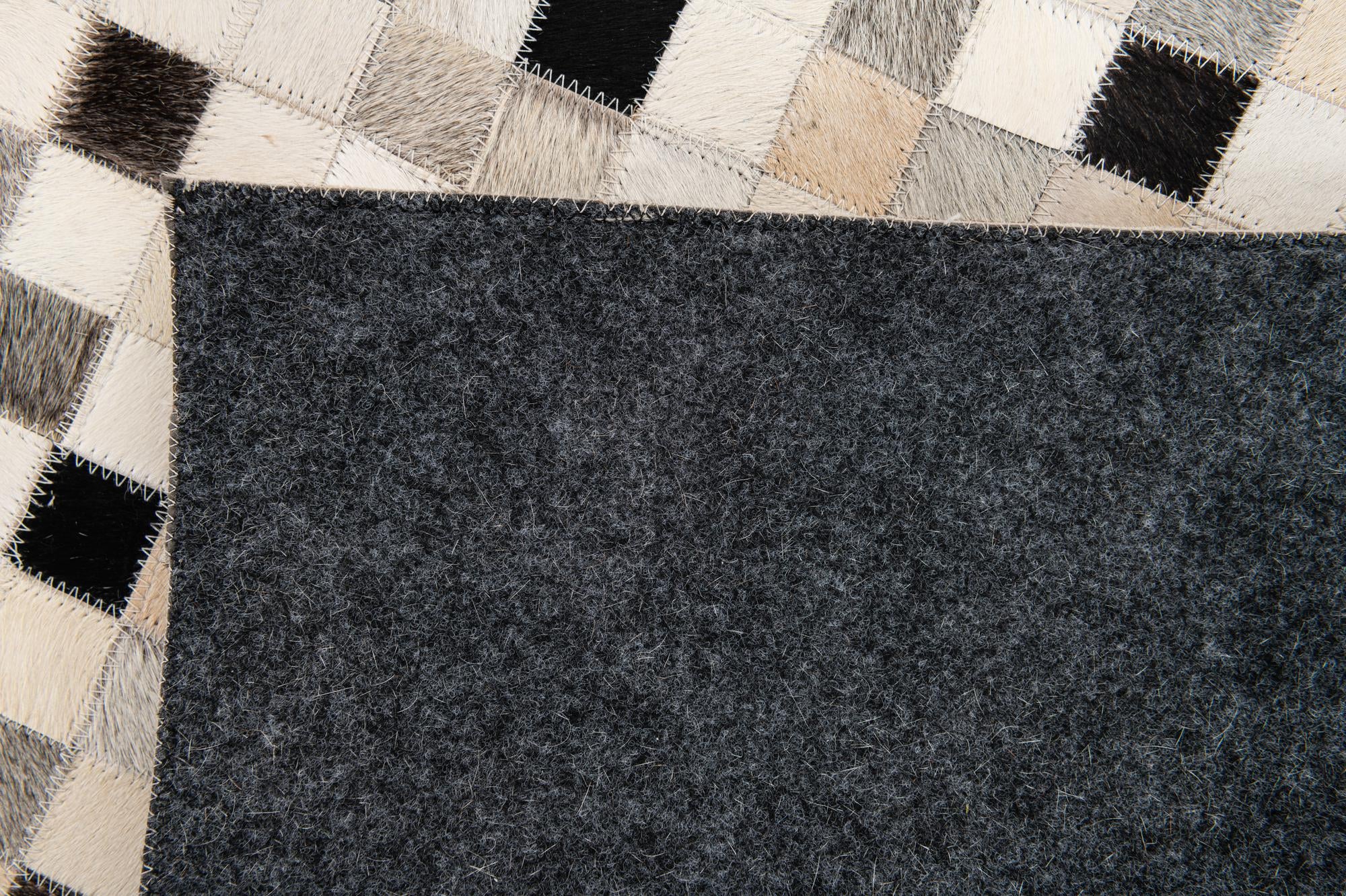 5' 1 x 8' Cowhide Stocks Rug