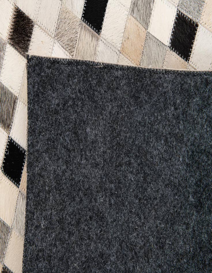 Detail image of 5' 1 x 8' Cowhide Stocks Rug