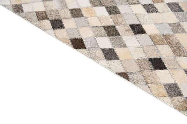 5' 7 x 7' 10 Cowhide Stocks Rug
