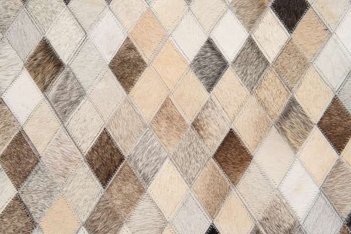 5' 7 x 7' 10 Cowhide Stocks Rug