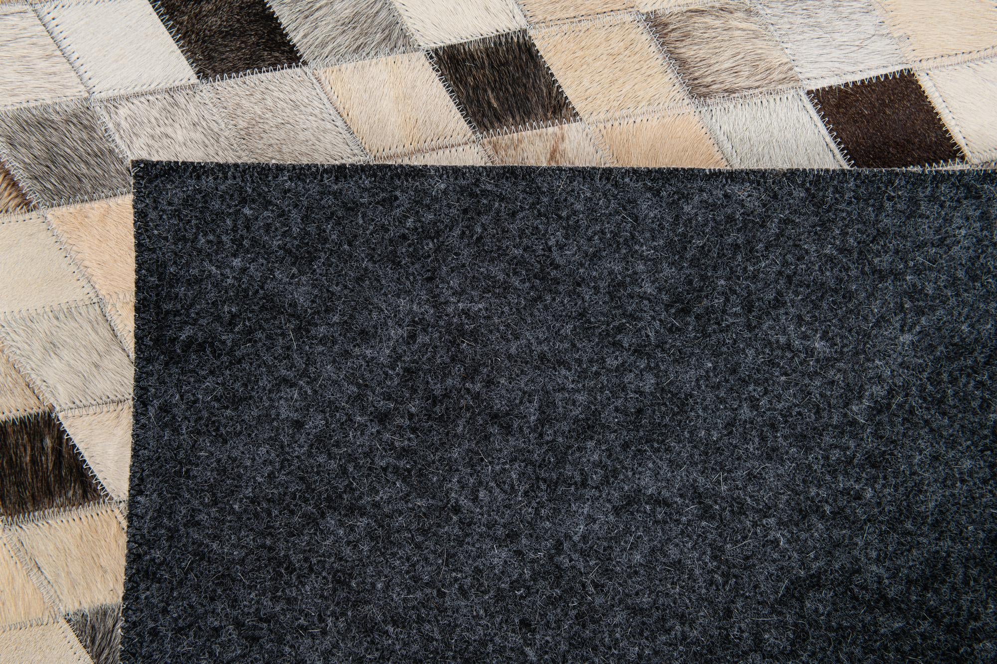5' 7 x 7' 10 Cowhide Stocks Rug