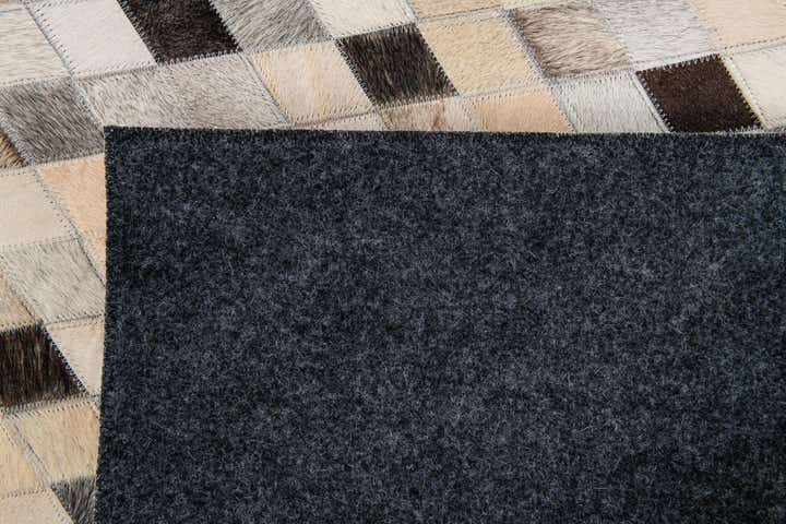 5' 7 x 7' 10 Cowhide Stocks Rug