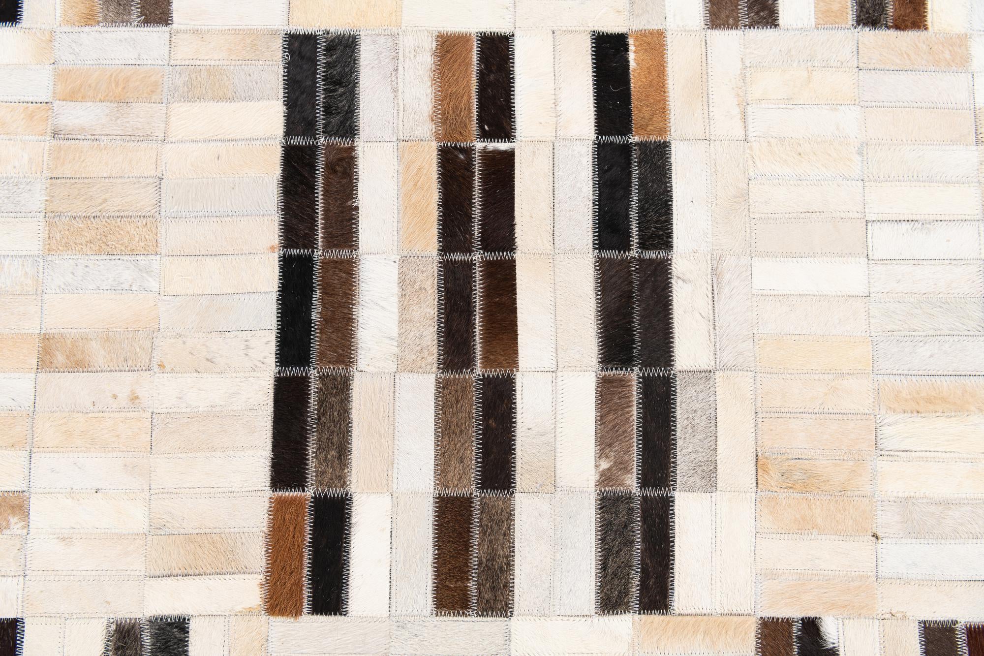 5' x 7' 11 Cowhide Stocks Rug