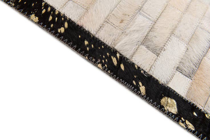 Detail image of 5' x 8' Cowhide Stocks Rug