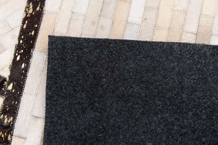 5' x 8' Cowhide Stocks Rug