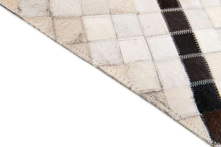 5' x 7' 10 Cowhide Stocks Rug