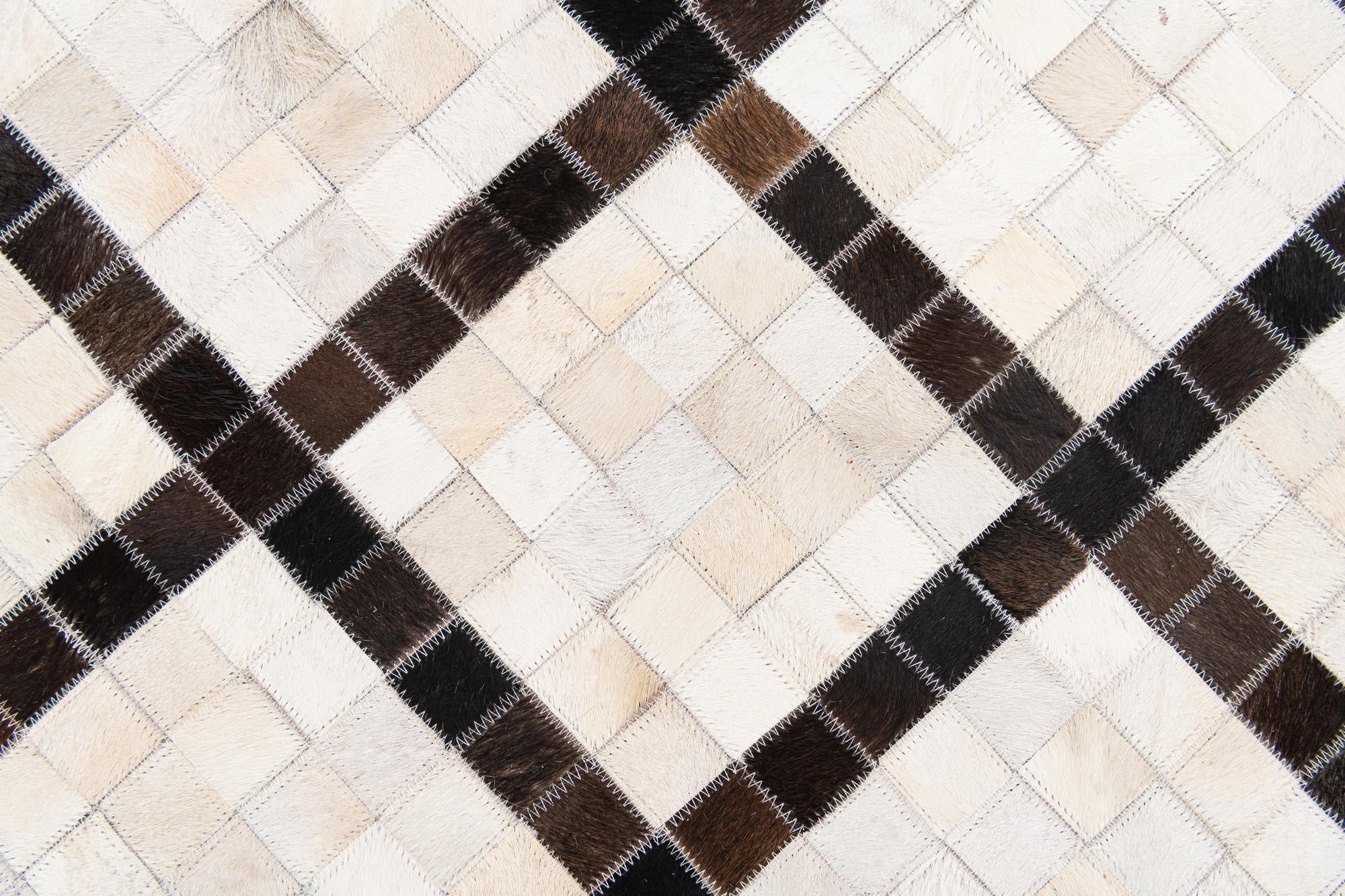 5' x 7' 10 Cowhide Stocks Rug