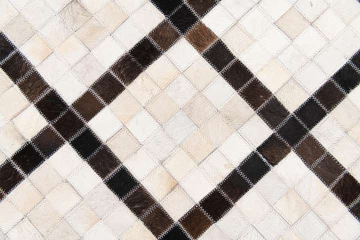 5' x 7' 10 Cowhide Stocks Rug