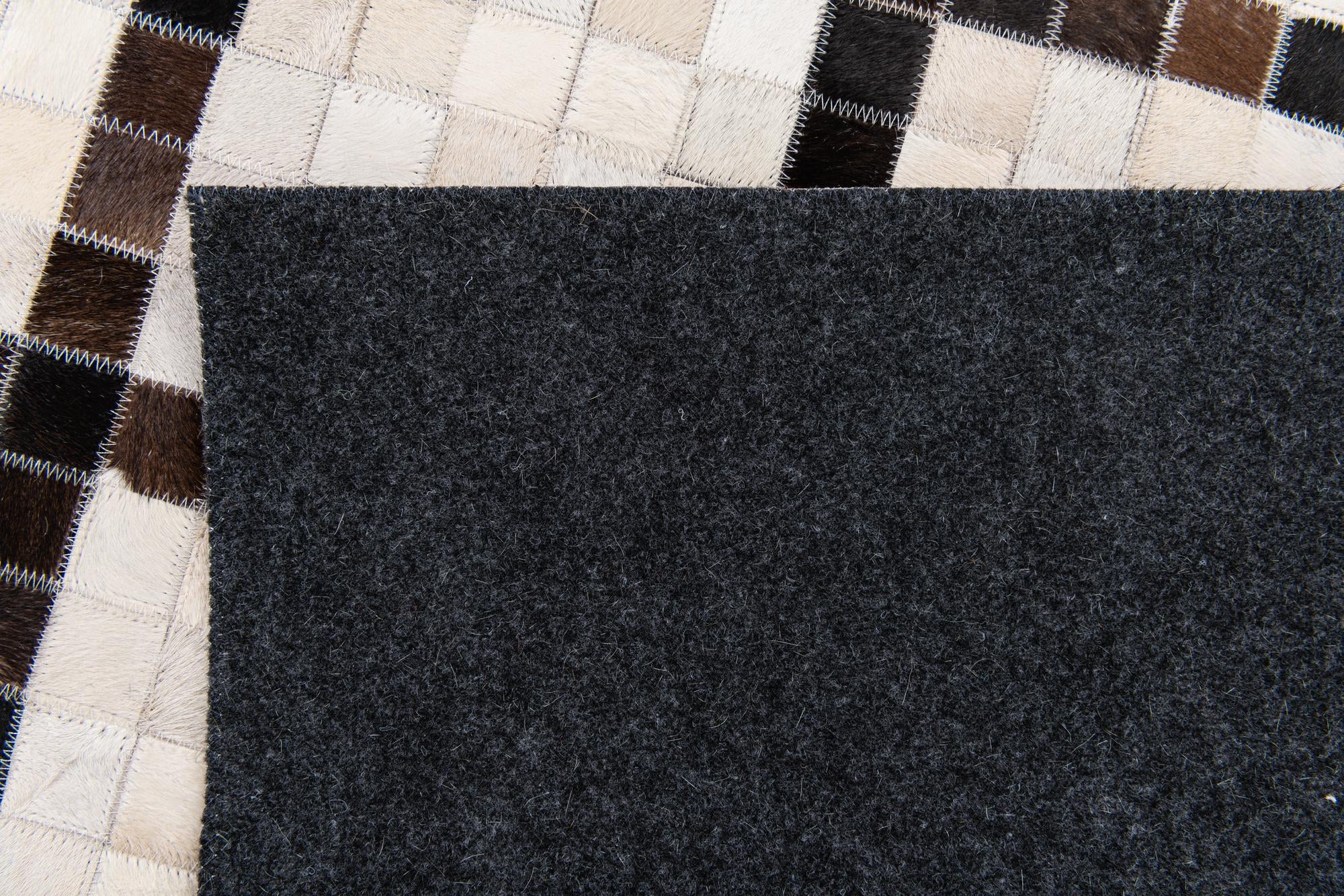5' x 7' 10 Cowhide Stocks Rug