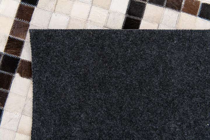 5' x 7' 10 Cowhide Stocks Rug