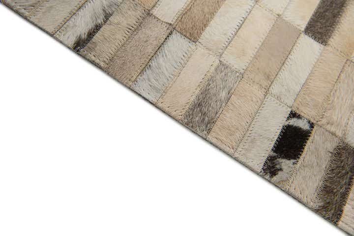 5' 1 x 7' 11 Cowhide Stocks Rug