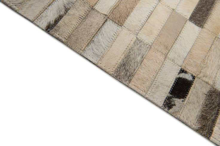 Detail image of 5' 1 x 7' 11 Cowhide Stocks Rug