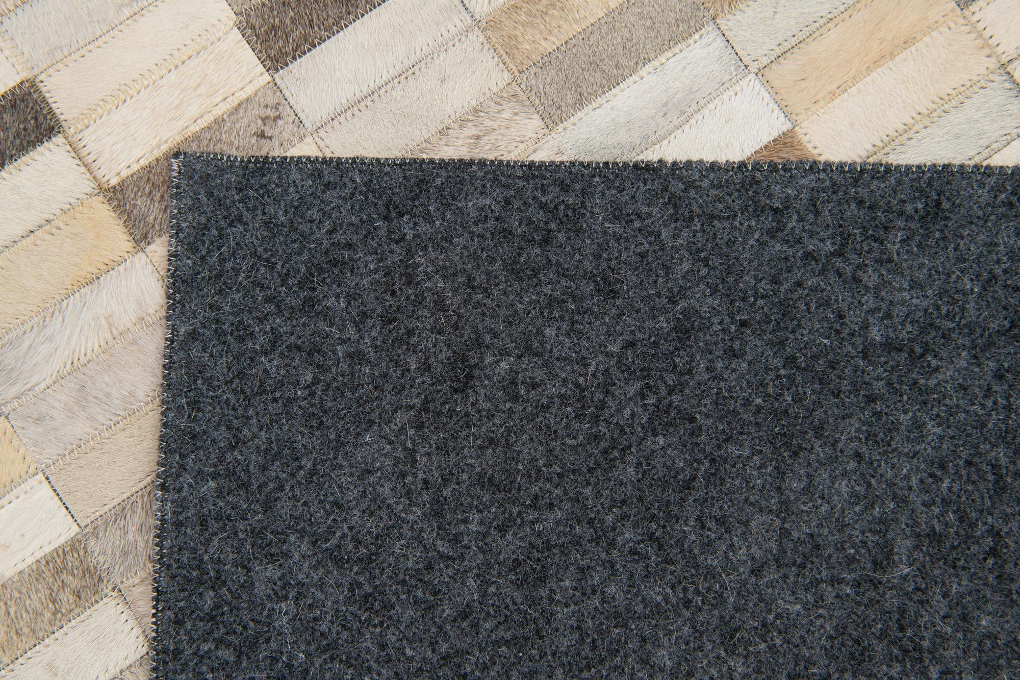 5' 1 x 7' 11 Cowhide Stocks Rug