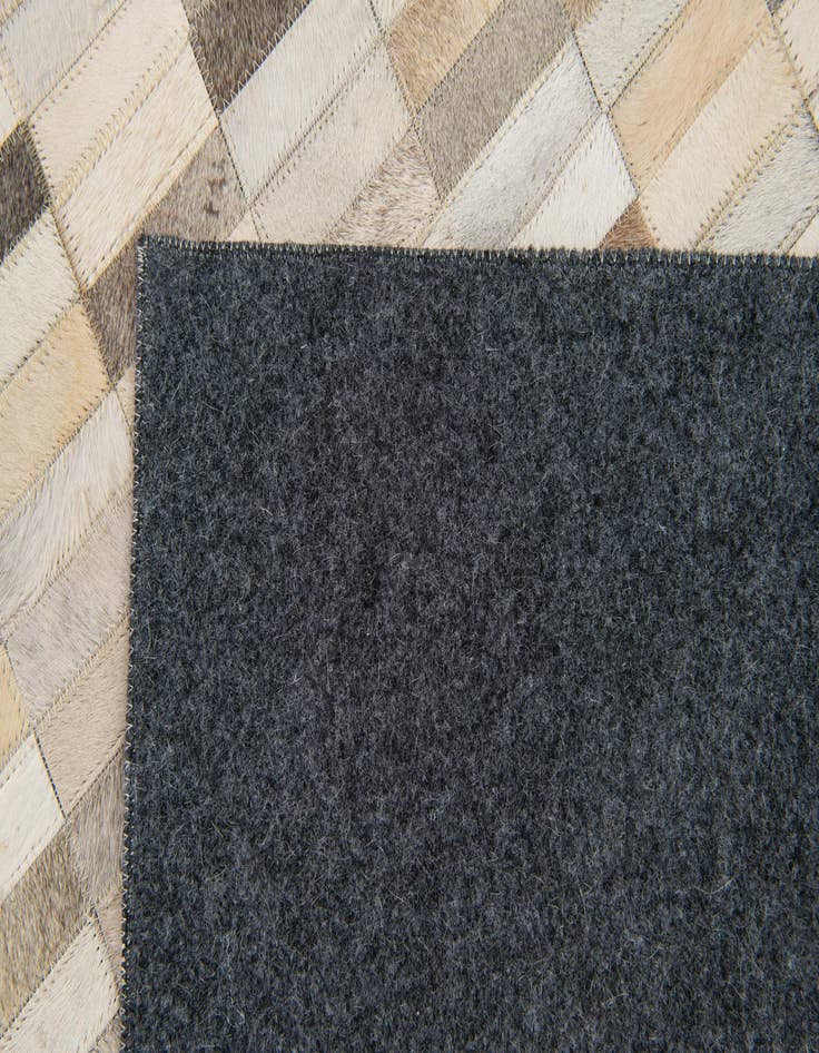 Detail image of 5' 1 x 7' 11 Cowhide Stocks Rug